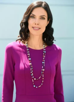 Kleid mit aufspringenden Kellerfalten